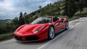 Caption: Sleek Ferrari 488 Spider Unleashes Power And Elegance Wallpaper