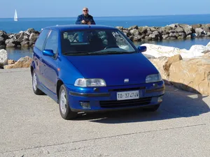 Caption: Sleek Fiat Punto In Motion Wallpaper