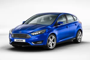 Caption: Sleek Ford Focus Cruising On The Road Wallpaper