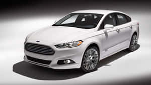 Caption: Sleek Ford Fusion Cruising On The Highway Wallpaper