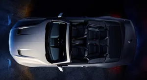 Caption: Sleek Ford Mustang Gt Convertible Cruising Down The Highways Wallpaper