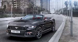 Caption: Sleek Ford Mustang Gt Convertible Wallpaper