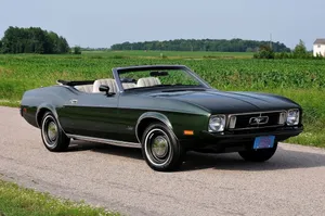 Caption: Sleek Ford Mustang Gt Convertible Showcasing Power And Beauty. Wallpaper