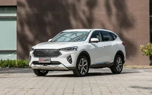 Caption: Sleek Haval Suv Cruising The Modern City Streets Wallpaper