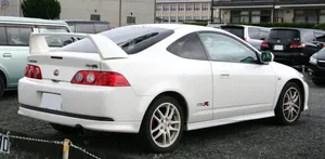 Caption: Sleek Honda Integra On The Road Wallpaper