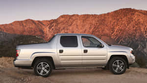 Caption: Sleek Honda Ridgeline On Outdoor Adventure Wallpaper