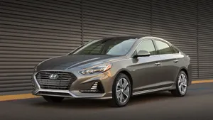 Caption: Sleek Hyundai Accent In Vibrant Surroundings Wallpaper