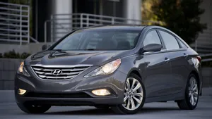 Caption: Sleek Hyundai Sonata On A Scenic Drive Wallpaper