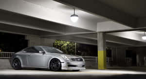 Caption: Sleek Infiniti G35 Sports Sedan In A Striking Urban Setting Wallpaper