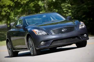 Caption: Sleek Infiniti G37 Gliding On The Highway Wallpaper
