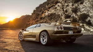 Caption: Sleek Lamborghini Diablo On The Open Road Wallpaper