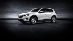 Caption: Sleek Mazda Cx-5 On The Road Wallpaper
