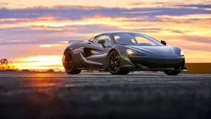 Caption: Sleek Mclaren 600lt On The Track Wallpaper