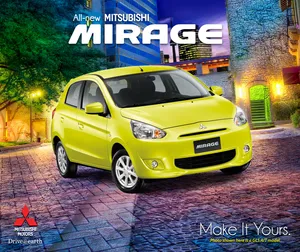 Caption: Sleek Mitsubishi Mirage Gliding On The Open Road. Wallpaper