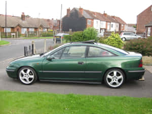 Caption: Sleek Opel Calibra- A Blend Of Performance And Elegance Wallpaper
