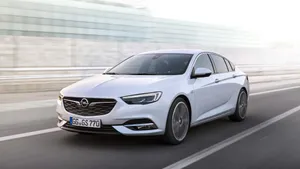 Caption: Sleek Opel Insignia On The Move Wallpaper