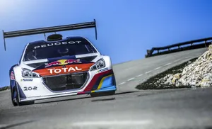 Caption: Sleek Peugeot 208 In Action Wallpaper