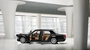 Caption: Sleek Red Hongqi Luxury Car On Highway Wallpaper