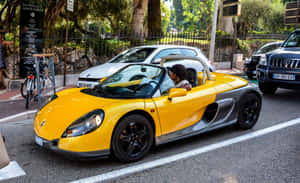 Caption: Sleek Renault Sport Spider On The Road Wallpaper