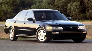 Caption: Sleek Silver Acura Legend In Motion Wallpaper