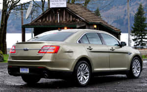 Caption: Sleek & Stylish Ford Taurus In Urban Setting Wallpaper