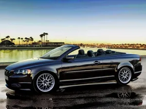 Caption: Sleek Volvo C70 Coupe On A Natural Background Wallpaper