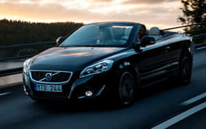 Caption: Splendid Volvo C70 In Striking Blue Wallpaper