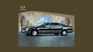 Caption: Ssangyong Rexton Driving On A Rainy Day Wallpaper