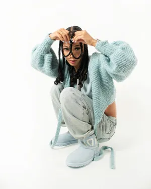 Caption: Star On The Rise: Coi Leray In Concert Wallpaper