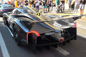 Caption: Striking Pagani Zonda C12 Roadster Exuding Power And Luxury Wallpaper