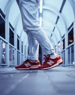 Caption: Striking Pair Of Red Shoes Wallpaper