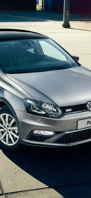 Caption: Striking Volkswagen Polo In Its Prime In Sublime Environment Wallpaper