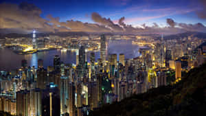 Caption: Stunning 4k Cityscape At Dusk Wallpaper