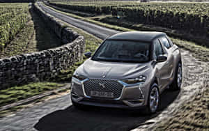 Caption: Stunning Citroen Ds3 Charging Down The Open Road Wallpaper