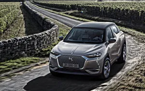 Caption: Stunning Citroen Ds3 Charging Down The Open Road Wallpaper