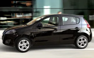 Caption: Stunning Fiat Palio In Motion Wallpaper