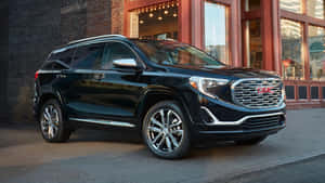 Caption: Stunning Gmc Terrain Suv On The Road Wallpaper