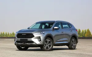 Caption: Stunning Haval Suv Cruising Through Mountainous Terrain Wallpaper