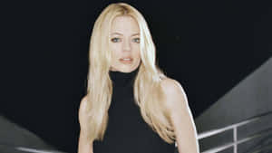 Caption: Stunning Jeri Ryan In A Photoshoot Wallpaper