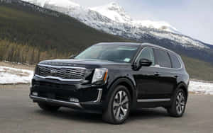 Caption: Stunning Kia Telluride In Nature Wallpaper