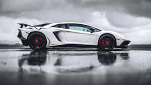 Caption: Stunning Lamborghini Aventador In Midnight City Wallpaper