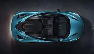 Caption: Stunning Mclaren 720s Spider In Full Speed Wallpaper