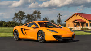 Caption: Stunning Mclaren Mp4-12c In Motion Wallpaper