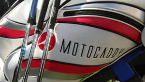 Caption: Stunning Motocaddy Golf Set In Action Wallpaper