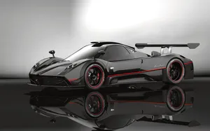 Caption: Stunning Pagani Zonda C12 Roadster In Motion Wallpaper