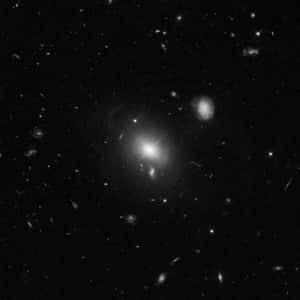 Caption: Stunning Quasar In The Cosmos Wallpaper