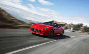 Caption: Stunning Red Ferrari California T In Motion Wallpaper