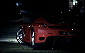 Caption: Stunning Red Ferrari Enzo On The Road Wallpaper