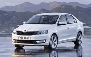 Caption: Stunning Skoda Rapid In Premium Silver Wallpaper