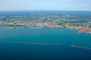 Caption: Stunning Sunset Over Thunder Bay Wallpaper